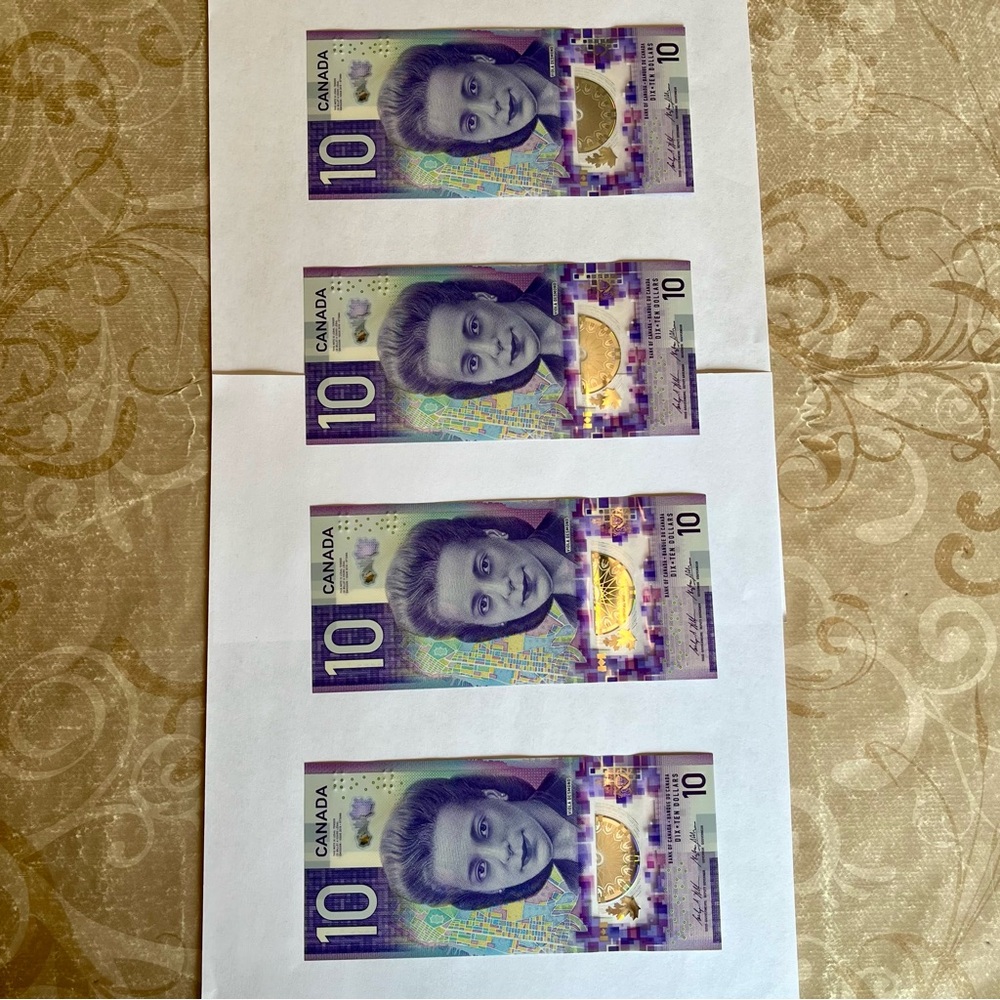 Four Consecutive Uncirculated Canadian Ten Dollar Bills